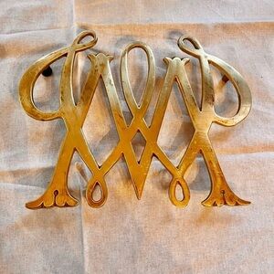 Vintage William and Mary brass trivet